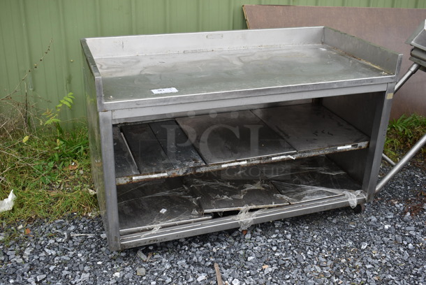 Stainless Steel Table w/ Back Splash and 2 Under Shelves on Commercial Casters. 56x27x36 - Image 2 of 6
