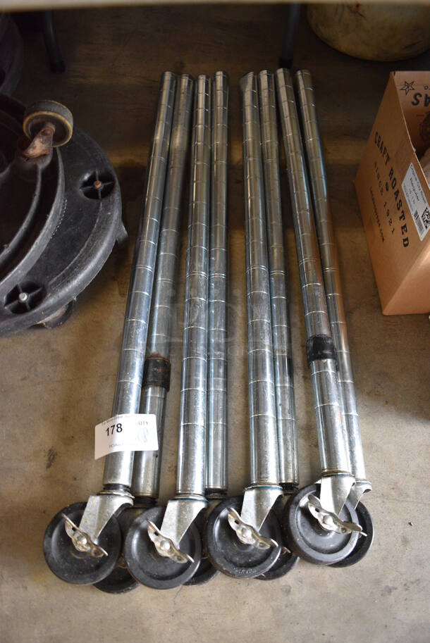 ALL ONE MONEY! Lot of 8 Chrome Finish Poles on Casters. 39