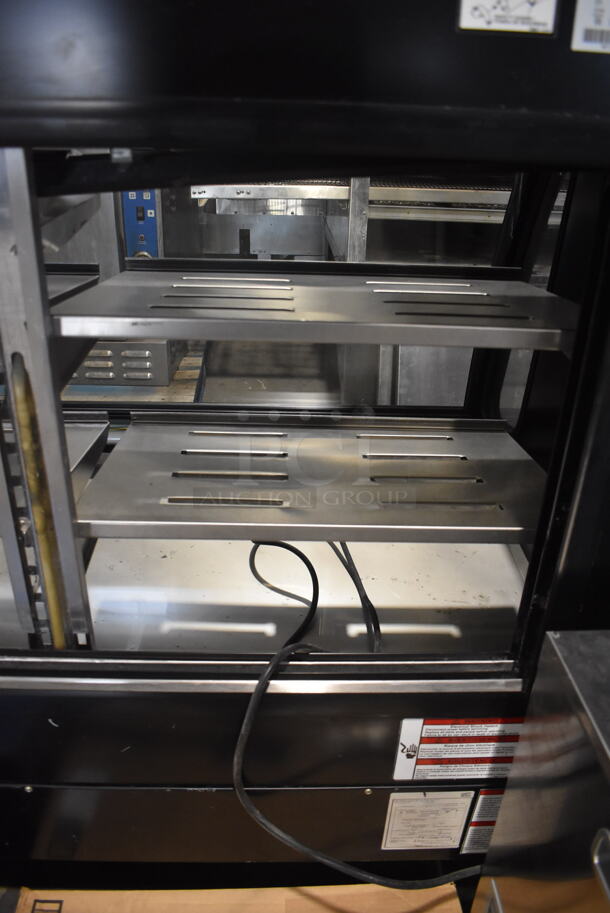2011 Model Torrey TEM150N-ULH Commercial Floor Style Electric Powered Glass Front in Black With Stainless Steel Adjustable Shelves Deli Case Model. 127V. Tested And Powers On But Does Not Get Cold - Image 6 of 8
