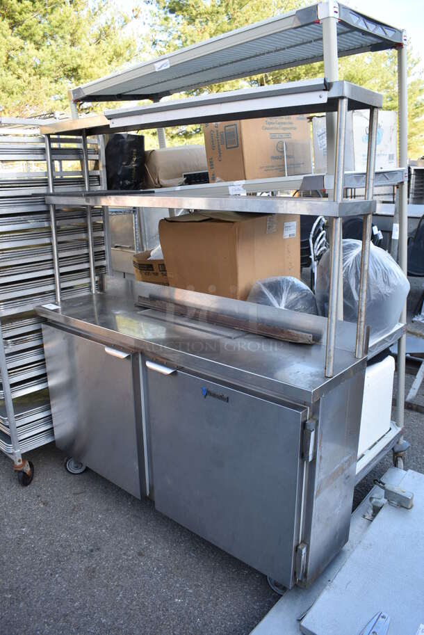 CustomCool Stainless Steel Commercial Table w/ 2 Doors, 2 Over Shelves and Order Holding Rod on Commercial Casters. 59x15x69 - Image 1 of 6