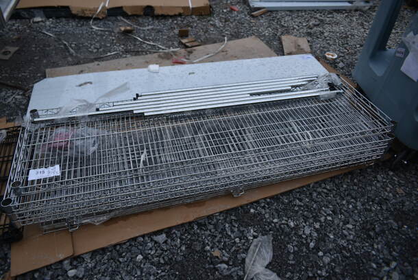 BRAND NEW SCRATCH AND DENT! 4 Tier Chrome Finish Rack w/ Liquor Cage.  - Image 1 of 4
