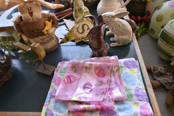 Wall Mount Table w/ Contents Including Spring Decor. BUYER MUST REMOVE: Bring Tools and Manpower Needed To Remove This Item. (booth room)  - Image 4 of 8