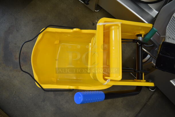 Lavex Yellow Poly Mop Bucket w/ Wringing Attachment and Commercial Casters.  - Image 3 of 5