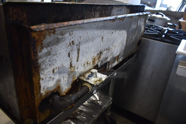 APW Wyott Stainless Steel Commercial Countertop Natural Gas Powered Flat Top Griddle.  - Image 5 of 7