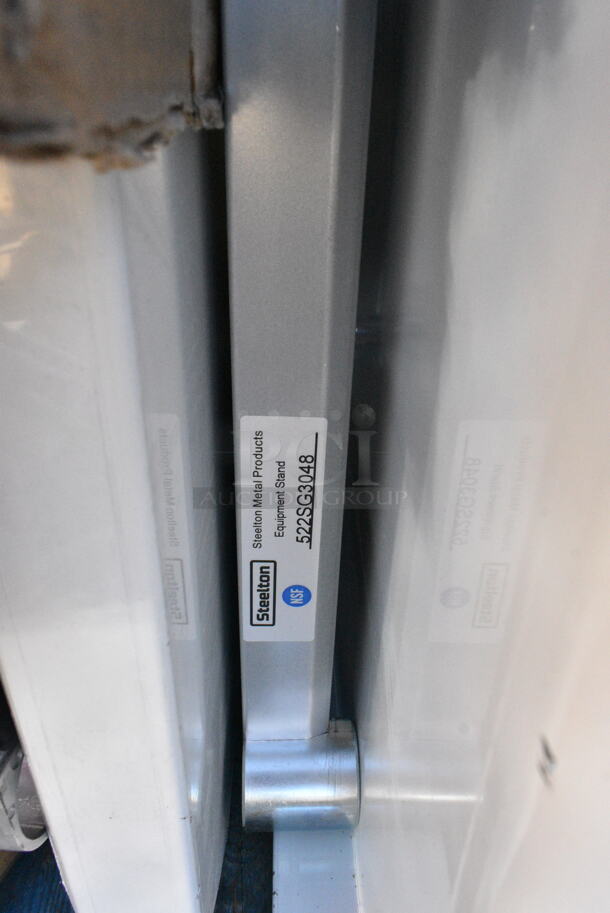 3 BRAND NEW SCRATCH AND DENT! Items Including 600TS1848S Regency 18" x 48" 16-Gauge 304 Stainless Steel Commercial Work Table with Undershelf, 522SG3048 Steelton 30" x 48" 18-Gauge Stainless Steel Equipment Stand with Undershelf and Galvanized Legs, RAF-5 Unit. 3 Times Your Bid! May Be Missing Pieces. - Image 4 of 5
