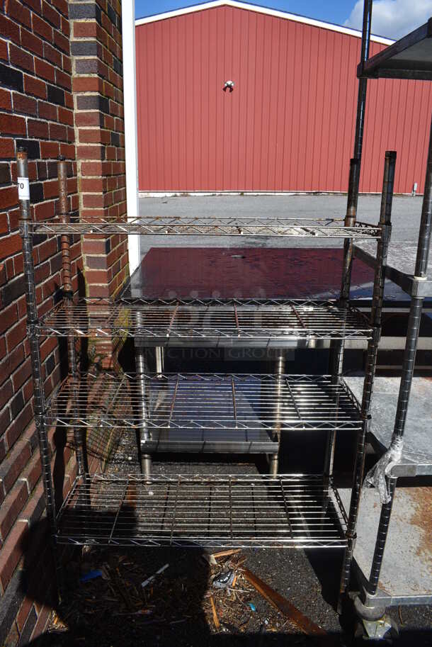 Chrome Finish 4 Tier Shelving Unit. BUYER MUST DISMANTLE. PCI CANNOT DISMANTLE FOR SHIPPING. PLEASE CONSIDER FREIGHT CHARGES. 36x14x54 - Image 1 of 4