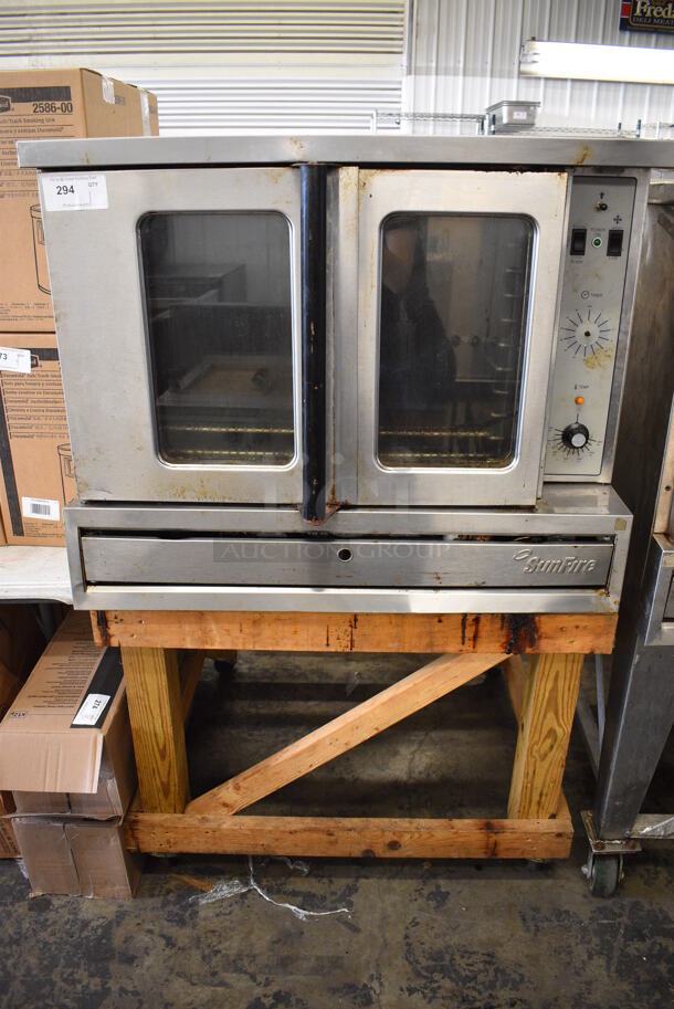 Garland SunFire Stainless Steel Commercial Natural Gas Powered Full Size Convection Oven w/ View Through Doors, Metal Oven Racks and Thermostatic Controls on Stand w/ Commercial Casters. 40x37x64