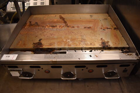 Vulcan SA36-107 Stainless Steel Commercial Countertop Natural Gas Powered Flat Top Griddle w/ Thermostatic Controls. 36x32x16