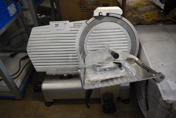 Avantco Model 300ES-12 Stainless Steel Commercial Countertop Meat Slicer w/ Blade Sharpener. 120 Volts, 1 Phase. 25x20x19. Tested and Working!