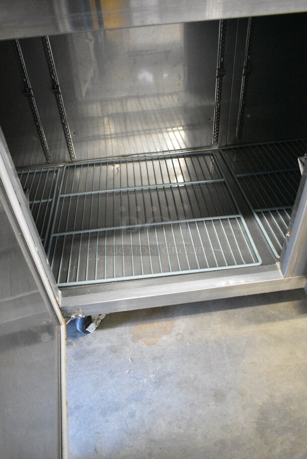 BRAND NEW SCRATCH AND DENT! 2023 Avantco 178SSUD3R Stainless Steel 3 Door Undercounter Cooler on Commercial Casters. 115 Volts, 1 Phase. Tested and Does Not Power On - Image 5 of 8