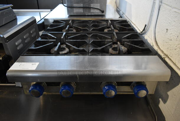 Imperial Stainless Steel Commercial Countertop Natural Gas Powered 4 Burner Range. 