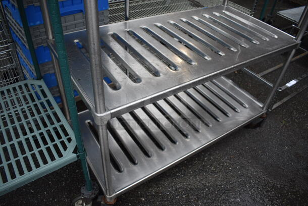 Metal 4 Tier Shelving Unit on Commercial Casters. BUYER MUST DISMANTLE. PCI CANNOT DISMANTLE FOR SHIPPING. PLEASE CONSIDER FREIGHT CHARGES. 48x24x69 - Image 4 of 5