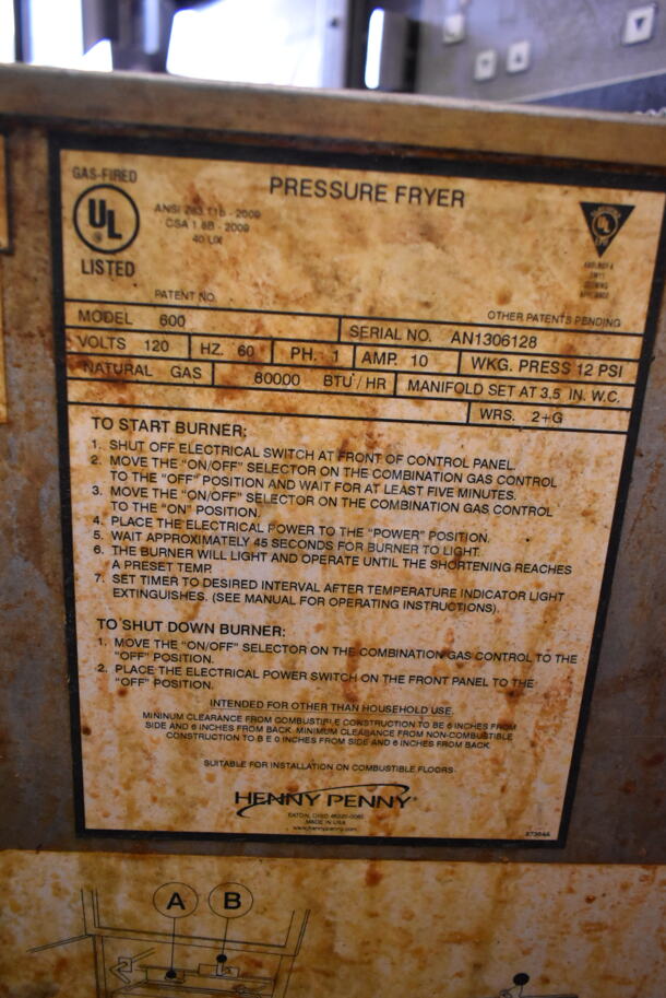 Henny Penny 600 Stainless Steel Commercial Floor Style Natural Gas Powered Pressure Fryer w/ Metal Fry Basket on Commercial Casters. 80,000 BTU. - Image 7 of 7