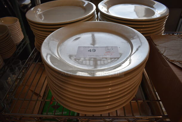 35 White Ceramic Plates. 10.5x10.5x1. 35 Times Your Bid!