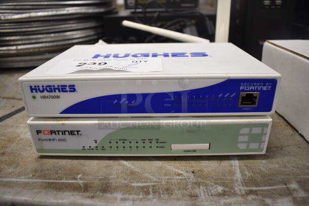 2 Items; Hughes HR4700W and Fortinet FortiWiFi 60C. 8.5x7.5x1.5. 2 Times Your Bid! - Image 1 of 4