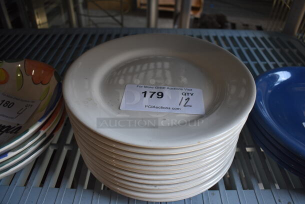 12 White Ceramic Plates. 10x10x1. 12 Times Your Bid!