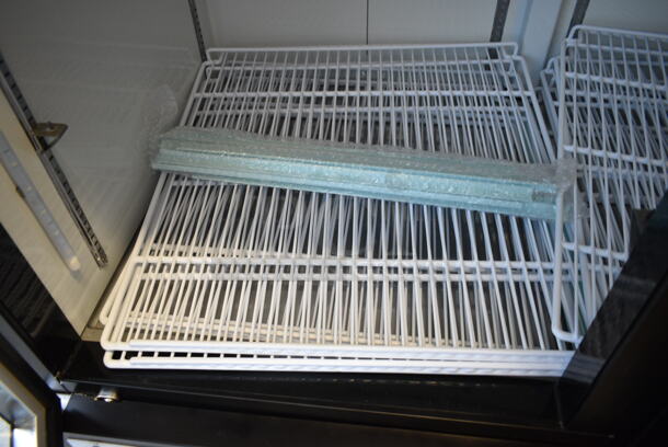 BRAND NEW SCRATCH AND DENT! 2024 Avantco 178GDC49HCB 53" Black Customizable Swing Glass Door Merchandiser Refrigerator with LED Lighting and Poly Coated Racks. 115 Volts, 1 Phase. Tested and Powers On But Does Not Get Cold - Image 8 of 10
