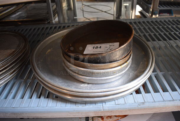 7 Various Metal Round Baking Pans. Includes 15.5x15.5x1. 7 Times Your Bid!