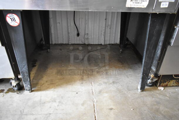 Hobart HGC5 Stainless Steel Commercial Propane Gas Powered Full Size Convection Oven w/ View Through Doors, Metal Oven Racks and Thermostatic Controls on Metal Legs.  - Image 4 of 6