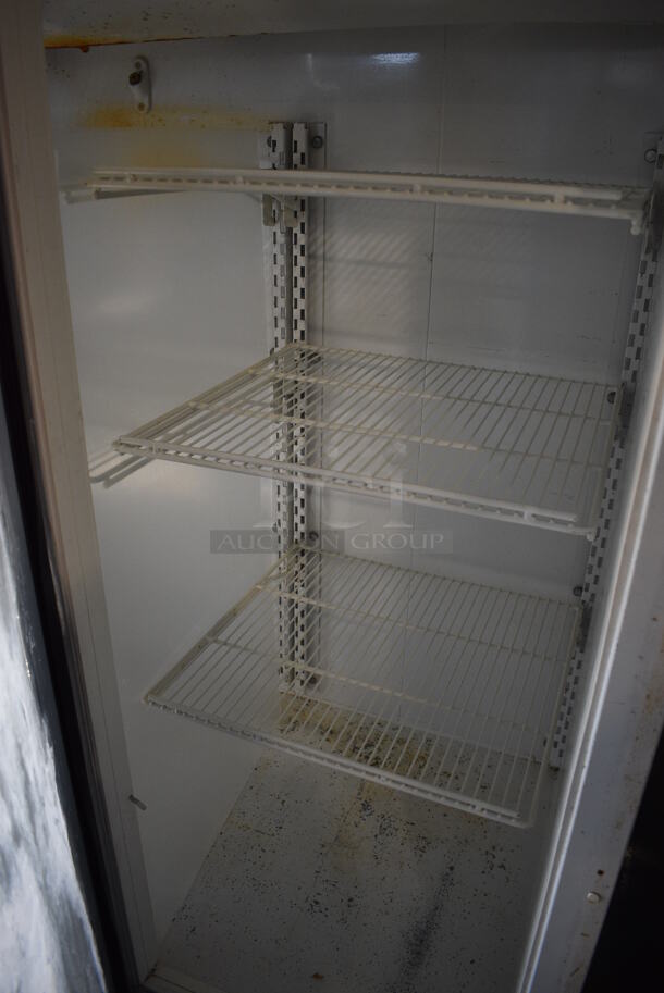 Kelvinator Model T80MGP Metal Commercial 3 Door Reach In Cooler Merchandiser w/ Poly Coated Racks on Commercial Casters. 115 Volts, 1 Phase. 78x37x78. Tested and Working! - Image 5 of 6