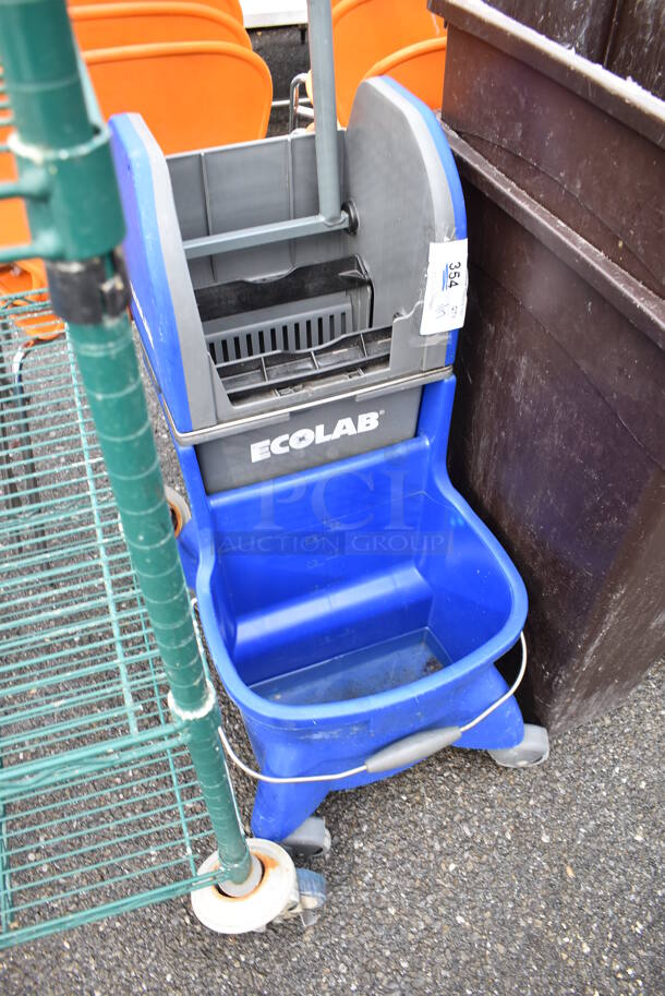 Ecolab Blue and Gray Poly Mop Bucket w/ Wringing Attachment on Commercial Casters. 15x20x40 - Image 2 of 3