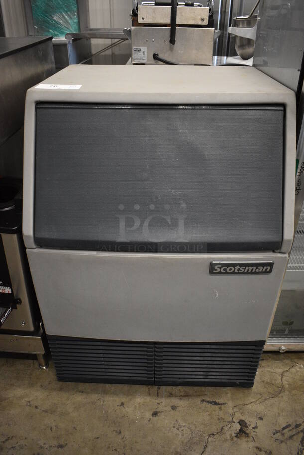 Scotsman Model AFE424A-1A Metal Commercial Floor Style Self Contained Ice Machine. Comes w/ Legs. 115 Volts, 1 Phase. 24x24x33