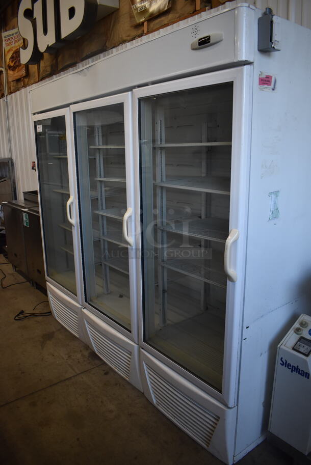 Hussmann ARL01050 Metal Commercial 3 Door Reach In Freezer Merchandiser w/ Poly Coated Racks. 230 Volts, 1 Phase. 85x29x80