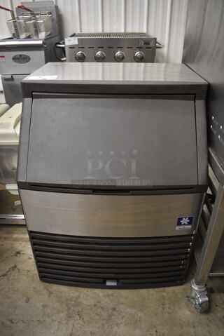 Manitowoc Model QY0134A Stainless Steel Commercial Self Contained Ice Machine. 115 Volts, 1 Phase. 26x25x33