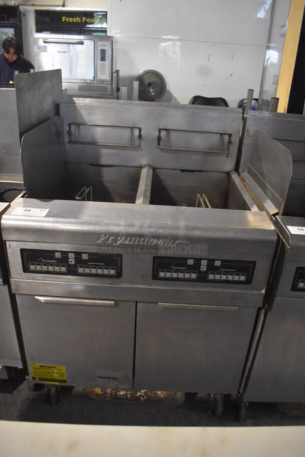 Frymaster FPPH255CSD Commercial Stainless Steel Natural Gas Floor Fryer With 2 Baskets on Commercial Caster. 80,000 BTU