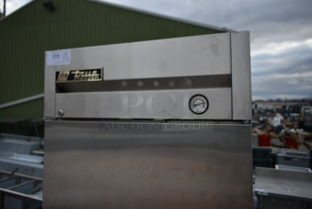 True T-23F Stainless Steel Commercial Single Door Reach In Freezer w/ Poly Coated Racks and Commercial Casters. 115 Volts, 1 Phase.  - Image 2 of 7