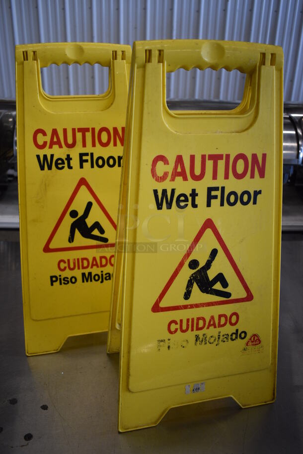 2 Yellow Poly Wet Floor Caution Signs. 12x15x24. 2 Times Your Bid!