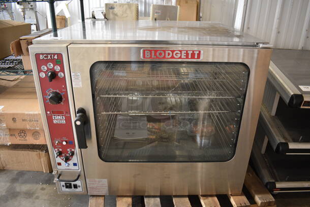 BRAND NEW SCRATCH AND DENT! Blodgett BCX14G/AA Stainless Steel Commercial Natural Gas and Steam Powered Combi Steamer Convection Oven w/ View Through Door and Thermostatic Controls. 115,000 BTU. 40x40x36