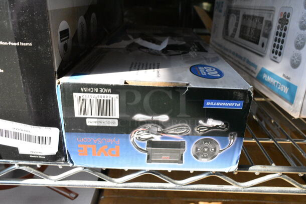 7 Various Items Including PLMRKT38W Pyle Marine Radio Receiver Speaker Set 12v Single Din Style Bluetooth Waterproof Digital Boat, PAD30MXUBT Pyle 3-Channel Bluetooth Mixer, PLMRMBT5B 2 Channel Bluetooth Marine Amplifier Kit, PKVS18SL NutriChef Automatic Food Vacuum Sealer, PRJG95 Pyle Multimedia Projector with 1080p Support, NutriChef NCFRYP14 Skillet. 7 Times Your Bid!  - Image 6 of 12