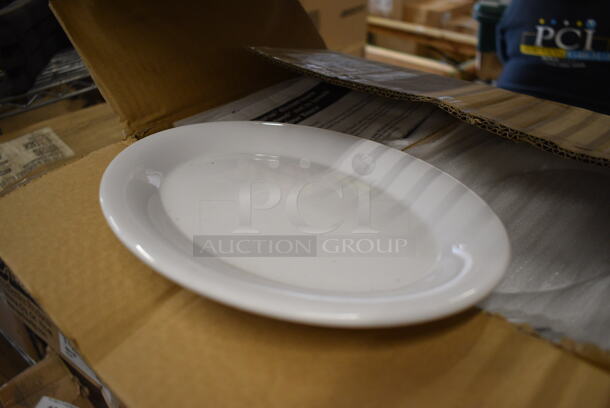ALL ONE MONEY! Lot of 24 BRAND NEW IN BOX! Carlisle White Poly Oval Plates. 9.5x7.25x1 - Image 2 of 4