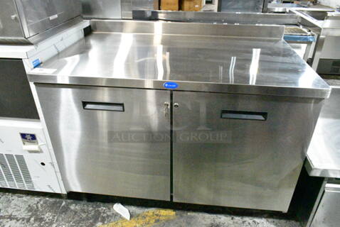 BRAND NEW! 2014 Randell 9302-7 Stainless Steel Commercial 2 Door Work Top Cooler on Commercial Casters. 115 Volts, 1 Phase. Tested and Powers On But Does Not Get Cold