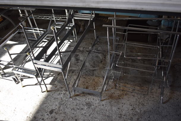 ALL ONE MONEY! Lot of Items Under Table Including 11 Various Metal Stands. Includes 8x24x3.5, 13x22x22, 9x15x18 - Image 1 of 7