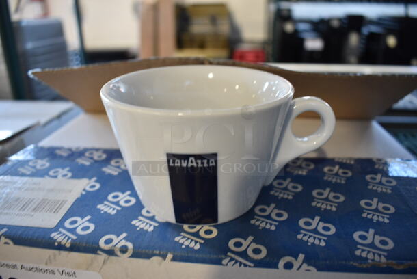 4 Boxes of 6 BRAND NEW Lavazza White Ceramic Mugs. 5x4x3. 4 Times Your Bid!