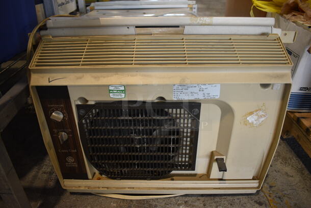 General Electric Model ATM04LAA1 Metal Window Mounted Air Conditioner. 115 Volts, 1 Phase. 32x14x16. Tested and Working!
