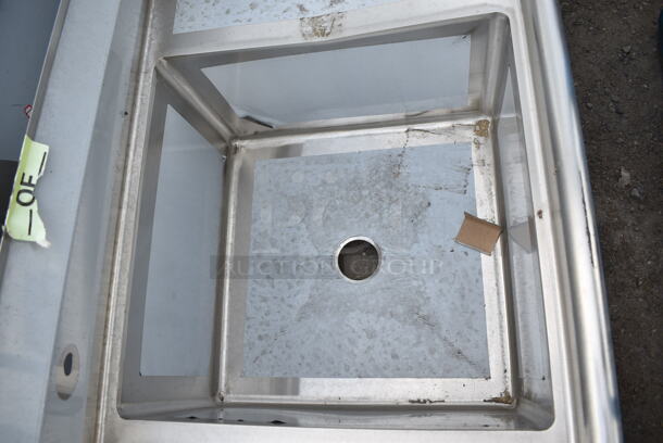 BRAND NEW SCRATCH AND DENT! Regency 600S22424224 98" 16 Gauge Stainless Steel Two Compartment Commercial Sink with Galvanized Steel Legs and 2 Drainboards - 24" x 24" x 14" Bowls.  - Image 5 of 9