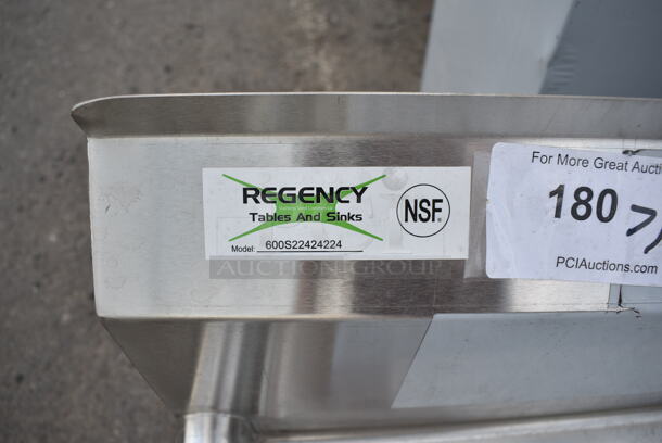 BRAND NEW SCRATCH AND DENT! Regency 600S22424224 98" 16 Gauge Stainless Steel Two Compartment Commercial Sink with Galvanized Steel Legs and 2 Drainboards - 24" x 24" x 14" Bowls.  - Image 9 of 9