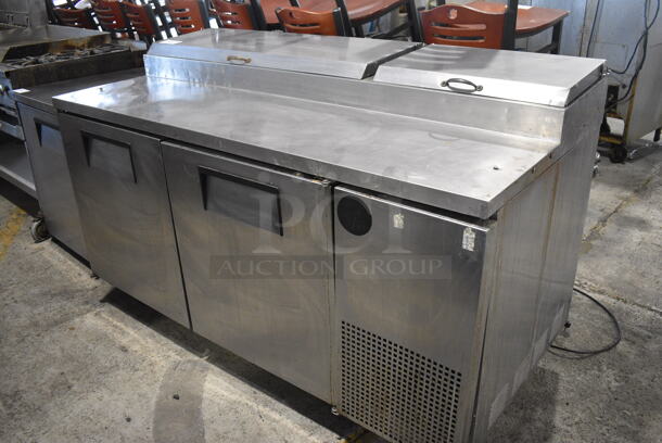 True Model TPP-67 Stainless Steel Commercial Pizza Prep Table on Commercial Casters. 115 Volts, 1 Phase. 67x33x41.5. Tested and Working!