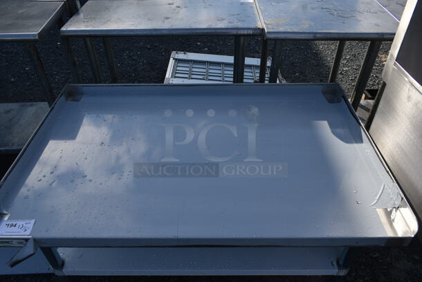BRAND NEW SCRATCH AND DENT! Regency 600ES3048G Stainless Steel Commercial Equipment Stand w/ Under Shelf.  - Image 2 of 5