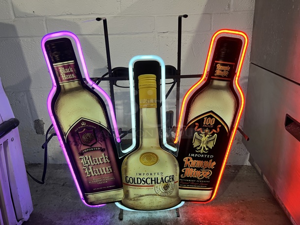 Goldschlager, Rumple Mize and Black Baus Neon Light Up Sign. Buyer Must Pick Up - We Will Not Ship This Item. 24x6x26. Tested and Working!