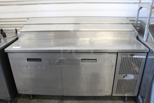 Randell Pizza Prep Table 8264NM w/ Poly Coated Racks on Commercial Casters. 115 Volt, 1 Phase. Tested and Powers On But Does Not Get Cold
 - Image 1 of 8