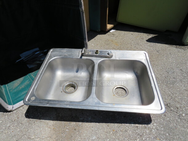 One Stainless Steel Sink. 33X10X6