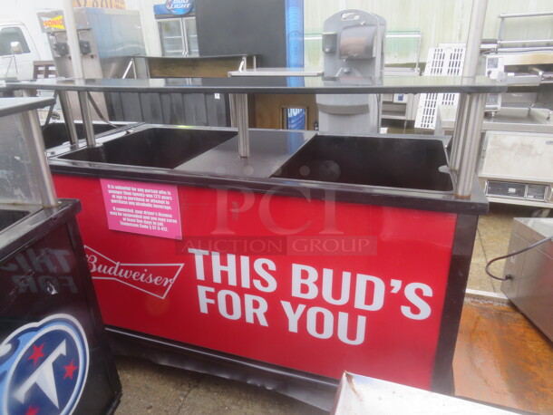 One Budweiser IRP Portable Drink Station With Over Shelf On Casters. 61.5X31.5X67