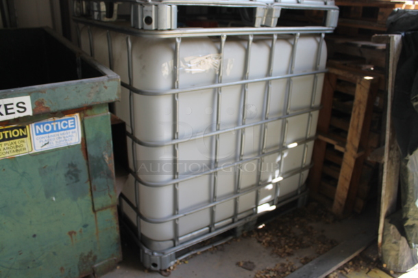 White Poly Tank in Metal Cage. BUYER MUST REMOVE. - Image 2 of 3