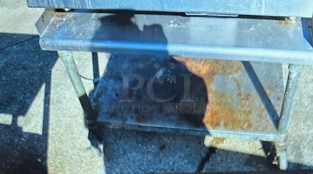 One Stainless Steel Table With Under Shelf On Casters. 37X32X27 - Image 1 of 1