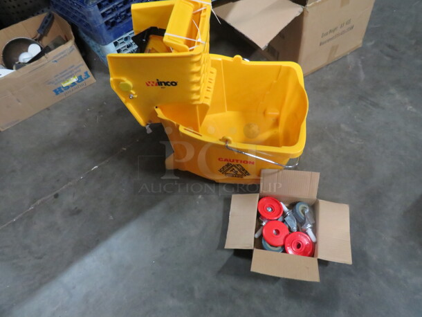 One NEW Mop Bucket And Wringer. Assembly Required. - Image 1 of 4