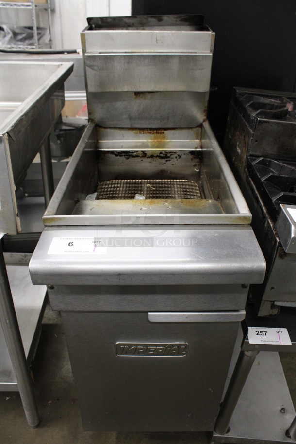 Imperial Stainless Steel Commercial Floor Style Natural Gas Powered Deep Fat Fryer on Commercial Casters. 15.5x34x51